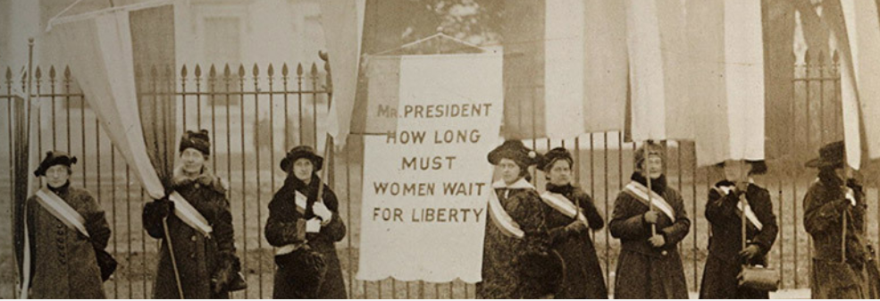 archival image of women campaigning for the vote