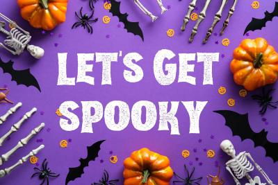Image says let's get spooky and shows skeleton hands, pumpkins and bats