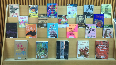 Photo of display shelf with a selection of recommended summer reads