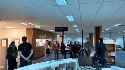 Staff speaking with prospective students