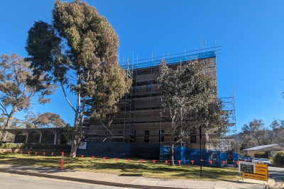Photograph of Menzies Library with scaffolding